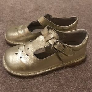 Little girls gold shoes